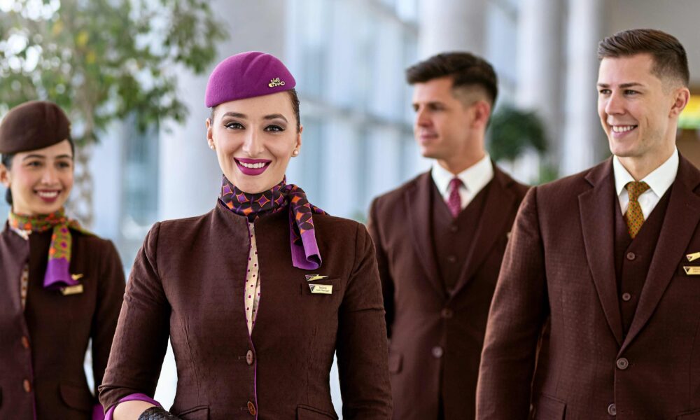 Smiling Etihad Airways Crew in terminal