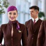 Smiling Etihad Airways Crew in terminal