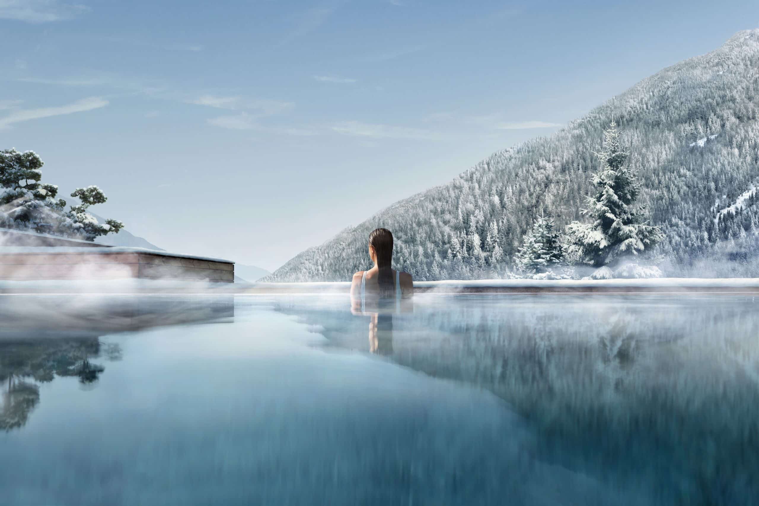 Infinity Pool Winter Bergpanorama Schnee Wellness Luxus Spa Alpen dampfendes Wasser Lefay Resorts