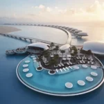 Futuristische Edelstahlvillen schweben auf Stelzen über dem Wasser und prägen die Silhouette des neuen Shebara Resorts. (Quelle: Shebara, The Red Sea)