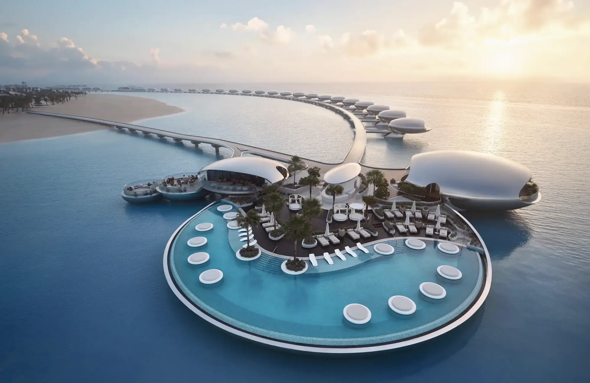 Futuristische Edelstahlvillen schweben auf Stelzen über dem Wasser und prägen die Silhouette des neuen Shebara Resorts. (Quelle: Shebara, The Red Sea)