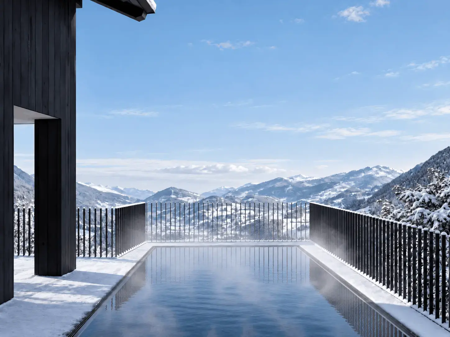 Vom beheizten Aussenpool reicht die freie Sicht weit über das verschneite Salzachtal bis zu den Hohen Tauern. (Quelle: ROSENSTOA Premium Chalets)